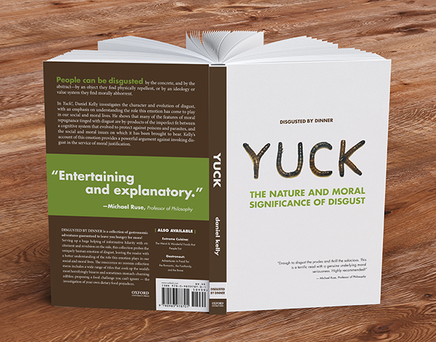 Book titled 'Extreme Cuisine'. The title treatment of the book consists of meal worms being used to making the word 'Yuck'.